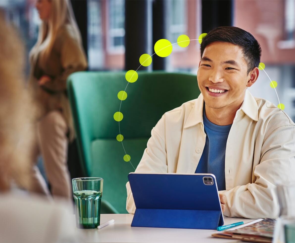 young-man-smiles-office