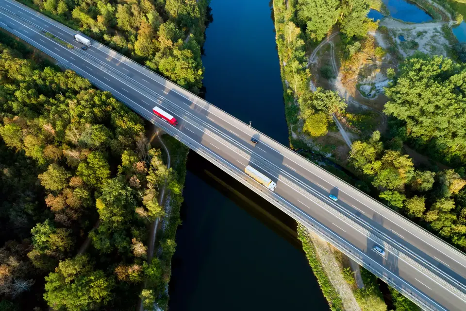 Aerial view of highway bridge river.